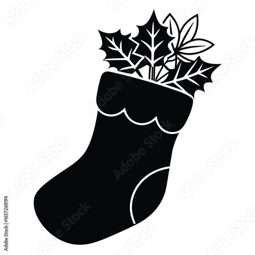 Black Christmas stocking with holly leaves festive