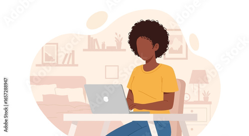 Black woman works on a laptop at home, depicting remote work, online learning, or digital lifestyle in a cozy modern setting.