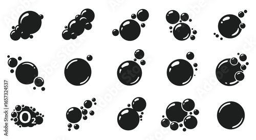 Collection of black bubbles in various sizes and shapes on white background