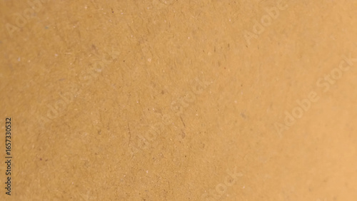 Background of brown kraft paper or cardboard texture. Brown recycled paper texture background.