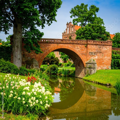Old stone bridge over tranquil water
