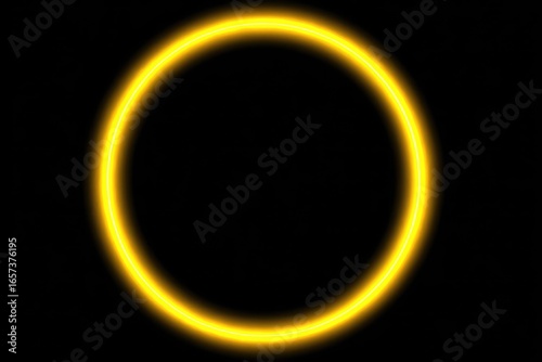 Glowing yellow circle on black background