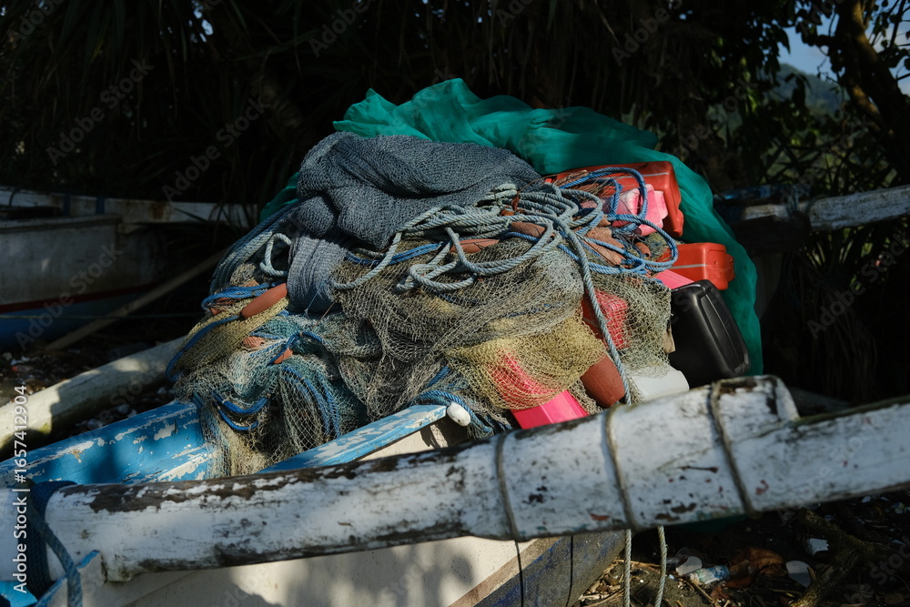 Obraz premium Pile of Fishing Nets and Ropes on an Old Fishing Boat