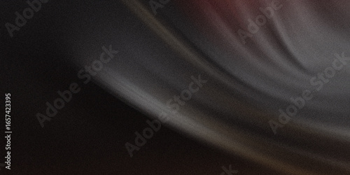 A somber abstract background with blurred motion creates a textured canvas of black, gray, and subtle light gradients
