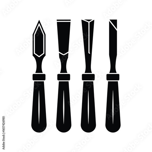 Four woodworking chisels silhouette