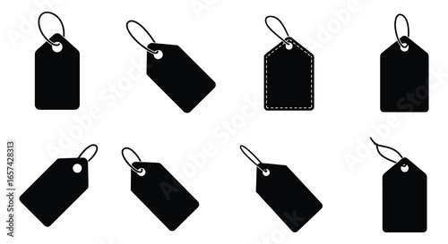 Collection of black price tags with strings on white background silhouette