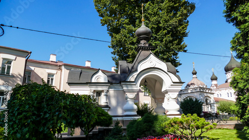 Fotografie churchyard, church, chapel, ornamental bushes, flowers, blooming, well-groomed f