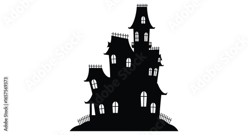 A black silhouette of a spooky haunted house with towers and fences