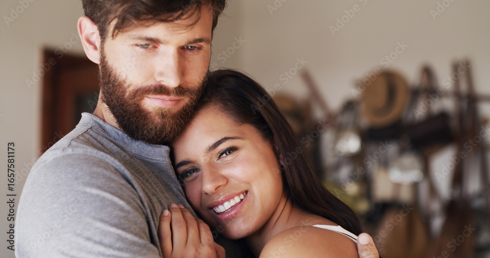 Fototapeta premium Connection, face and hug with couple in home together for comfort, safety or security of relationship. Bonding, portrait and smile of woman on chest of man in apartment for cuddle, love or romance