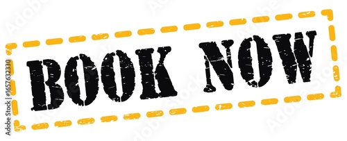 BOOK NOW text written on yellow-black stamp sign.