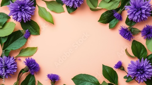Floral Frame with Purple Flowers and Green Leaves on Peach Background