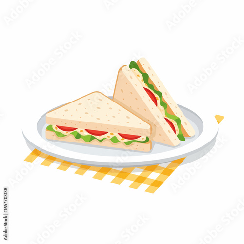 Two fresh triangular sandwiches with lettuce and tomato on a white plate over a yellow checkered napkin.