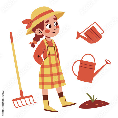 Cheerful girl in overalls with gardening tools farmer