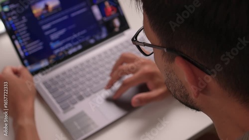 An Individual Deeply Focused on Working with a Laptop while Engaged in Programming Tasks AI and deep learning. Neural network model and diagram. Businessman using laptop computer to train AI.