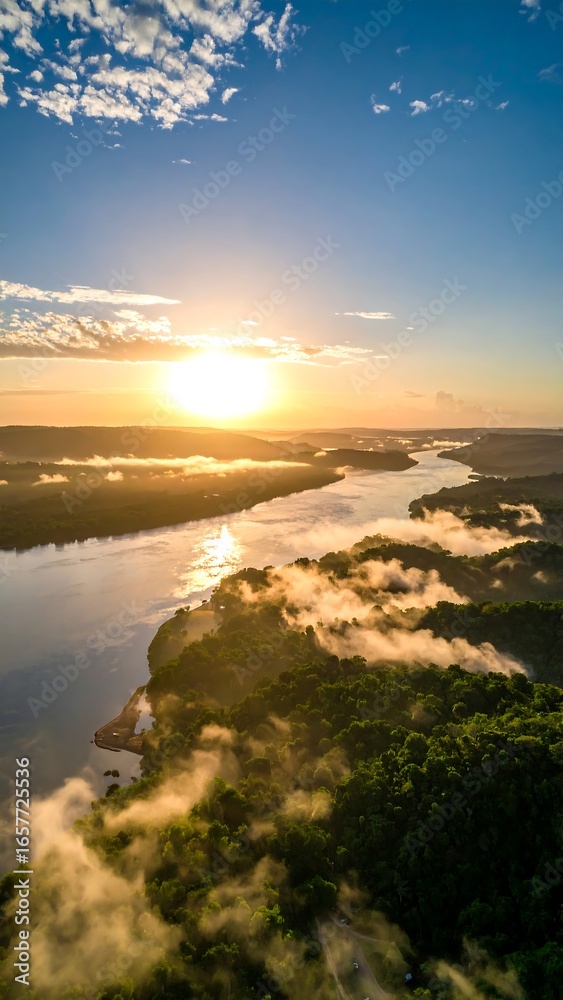 Fototapeta premium Sunrise over a river valley
