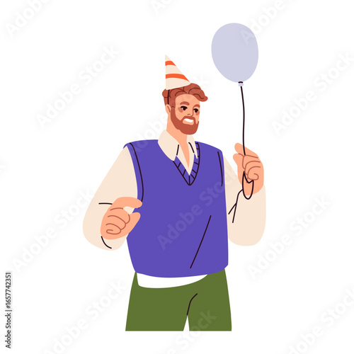 Happy man in birthday party cone, holding balloon, celebrating. Joyful office...