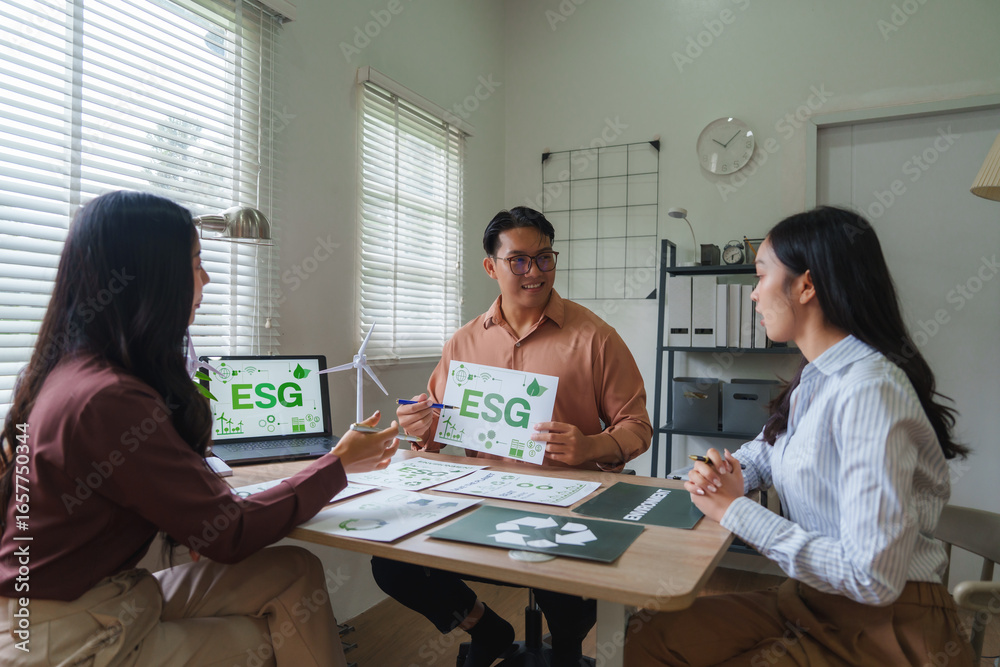 Fototapeta premium Group of managers discussing environmental, social, and governance - esg - policies in meeting