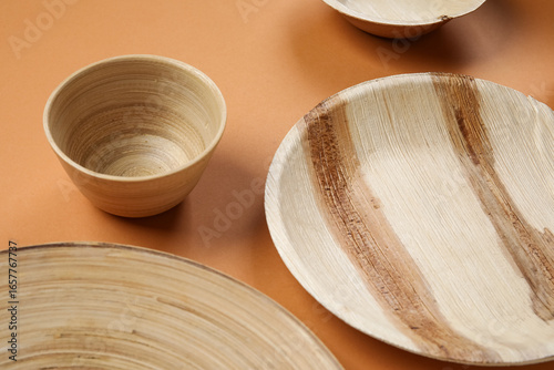 Wooden plates and bowl on b...