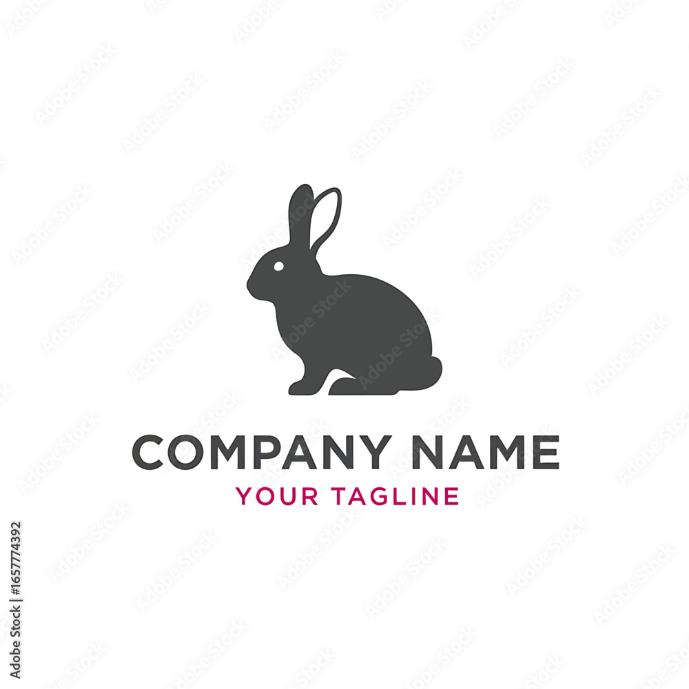 Fototapeta premium Silhouette of a dark grey rabbit sitting upright, with 