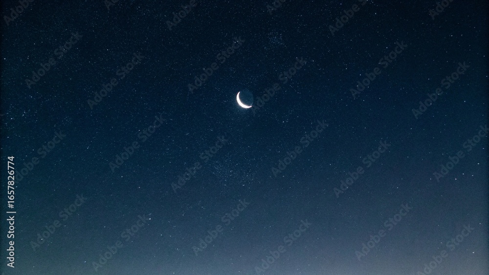 Naklejka premium Minimalist Crescent Moon in Dark Sky