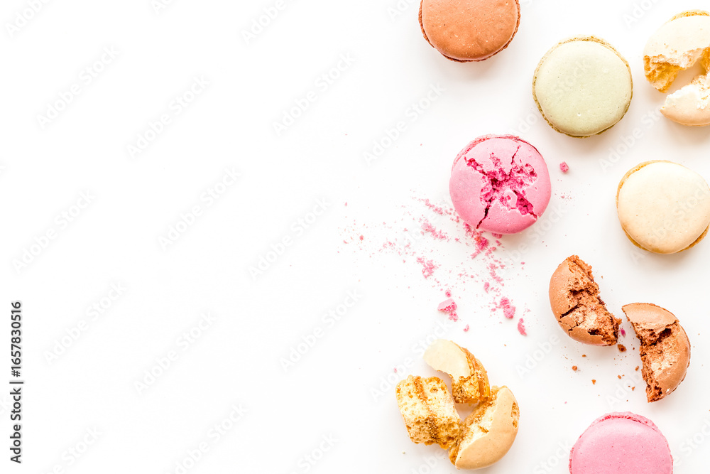 Fototapeta premium Macarons design on white background top view space for text