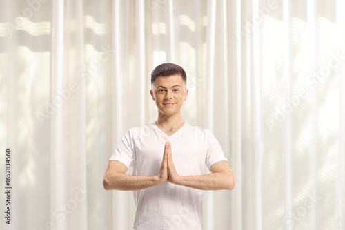 Guy practicing balance yoga Free Download Guy practicing balance yoga - GFXLoad