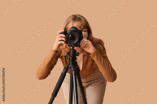 Beautiful young woman takin...