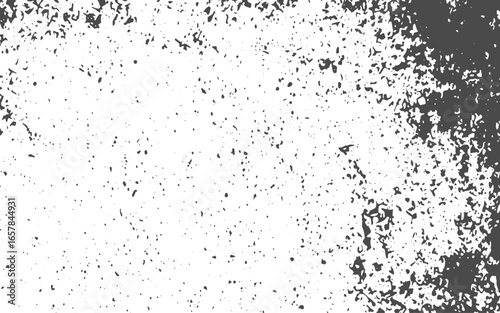 Abstract black particles exploding on white background.black sand with spots isolated on white