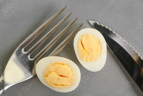 Hard boiled egg halves with...