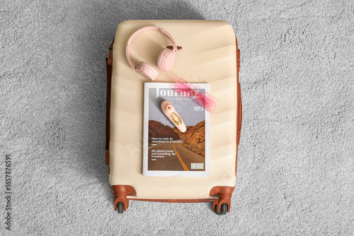 Stylish suitcase with vibra...