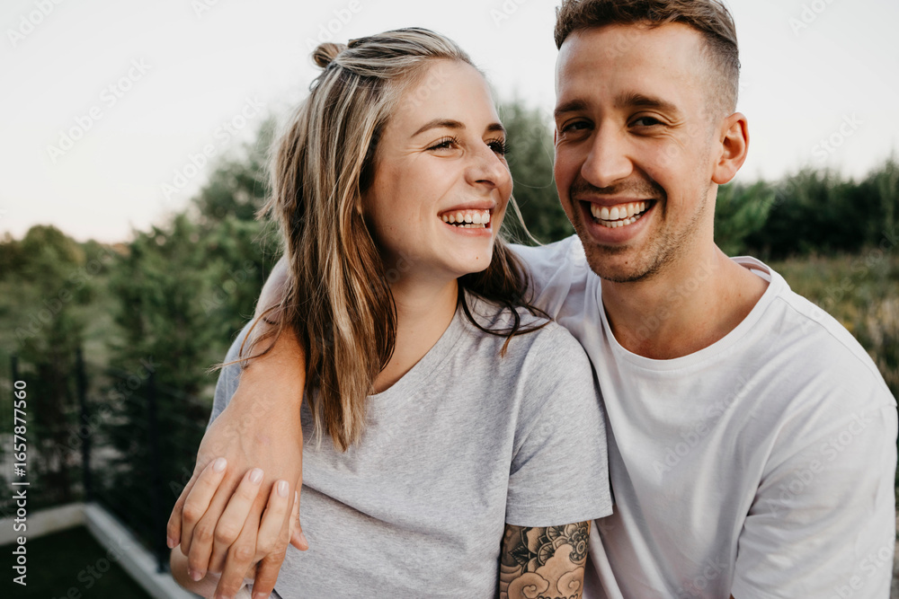 © TrueShot | Westend61 - Portrait of young laughing couple © TrueShot | Westend61 - Portrait of young laughing couple