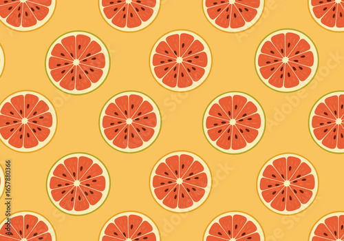 Abstract pattern of citrus fruit slices on yellow background