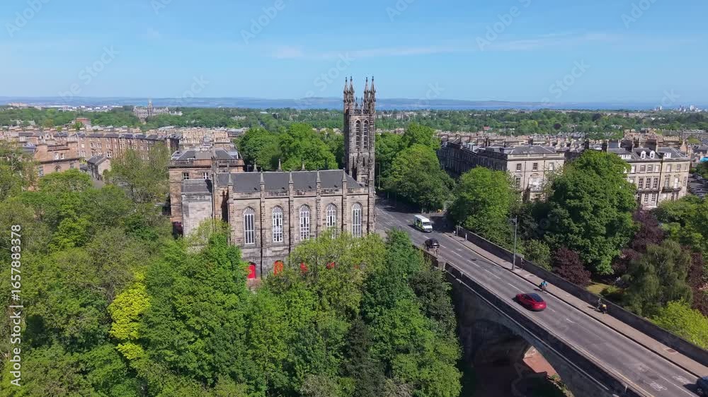 Drone orbit around Rhema Christian Church and Dean Bridge, unveiling Edinburgh’s stunning gothic charm and the surrounding cityscape Drone orbit around Rhema Christian Church and Dean Bridge, unveiling Edinburgh’s stunning gothic charm and the surrounding cityscape