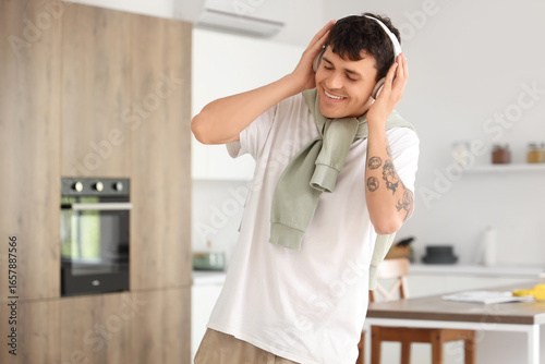 Young man with headphones l...