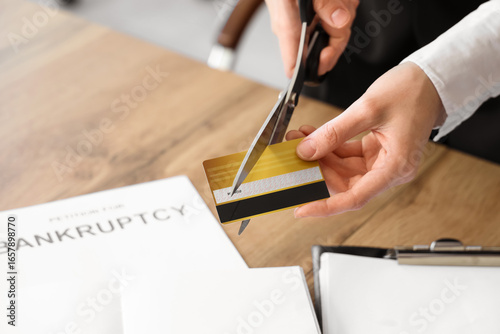 Bankrupt businesswoman cutt...