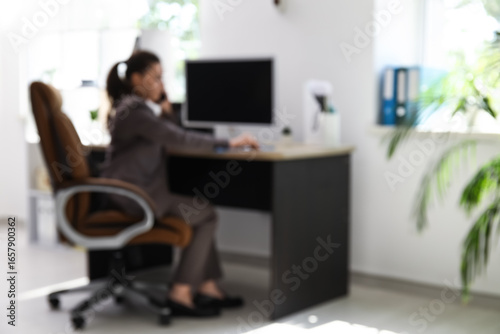 Female office worker sittin...