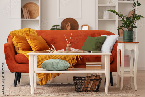 Coffee table with books, ma...