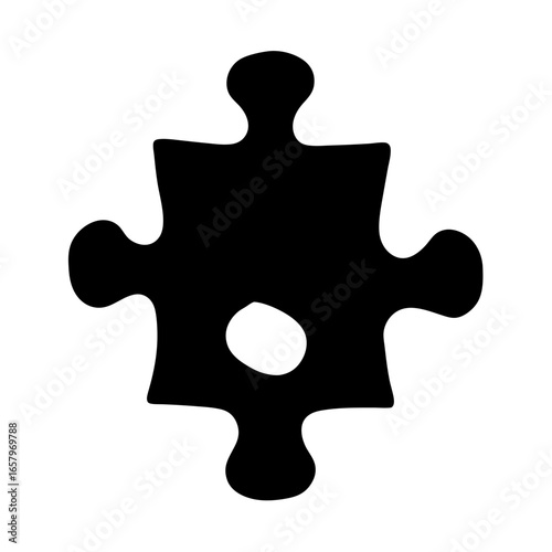 A single black jigsaw puzzle piece with a hole in the center
