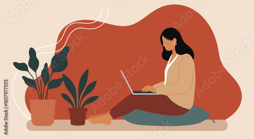 Woman working on laptop from home, sitting comfortably with plants nearby. Represents remote work, productivity, flexible modern lifestyle.