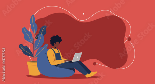 A person comfortably works on a laptop from home, highlighting remote productivity, online learning, or creative freelance work in a relaxed setting.