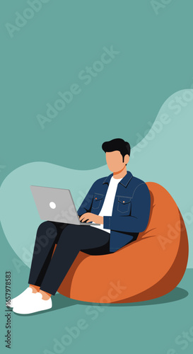 Young man sitting comfortably on a bean bag chair, focused on his laptop. Ideal for remote work, freelance, online learning, and relaxed productivity.