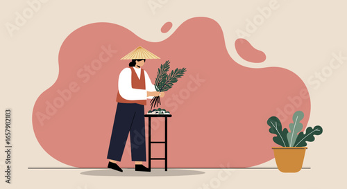 Individual in traditional conical hat preparing fresh green foliage, evoking concepts of nature, culture, and sustainable living. Ideal for travel or lifestyle content.