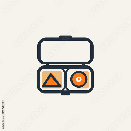 Open Bento Box with Geometric Shapes and Orange Accents