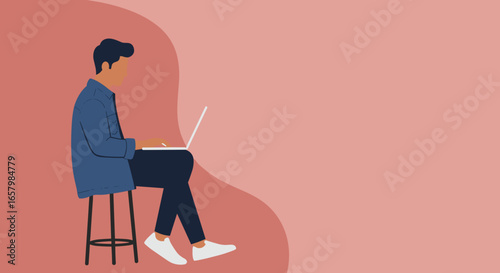 Focused man sitting on a stool, typing on his laptop. Represents remote work, online learning, or digital lifestyle. Ample copy space.