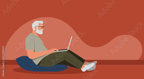 Senior man comfortably works on his laptop from home, embodying modern digital lifestyle, remote work, online learning, and leisure.