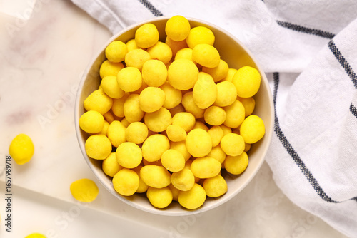Bowl with cheese coated pea...