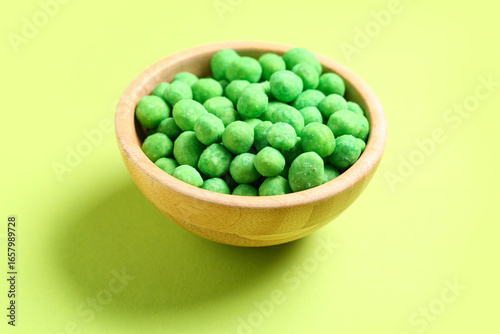 Bowl with wasabi coated pea...