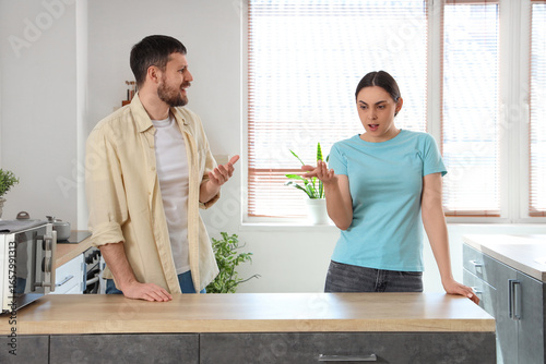 Young couple quarreling in ...