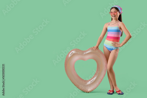 Cute girl with heart shaped...