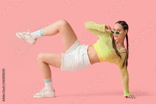Stylish young woman in croc...